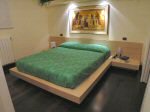 Una camera da letto a Milano